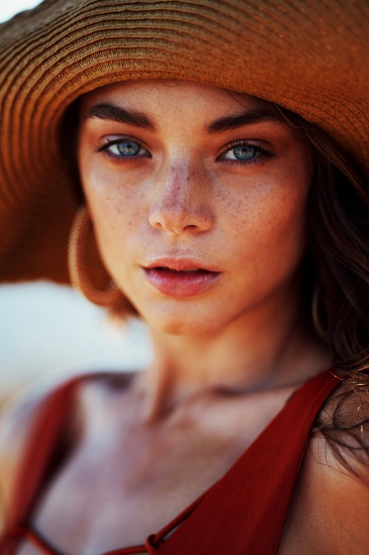 Camille E.